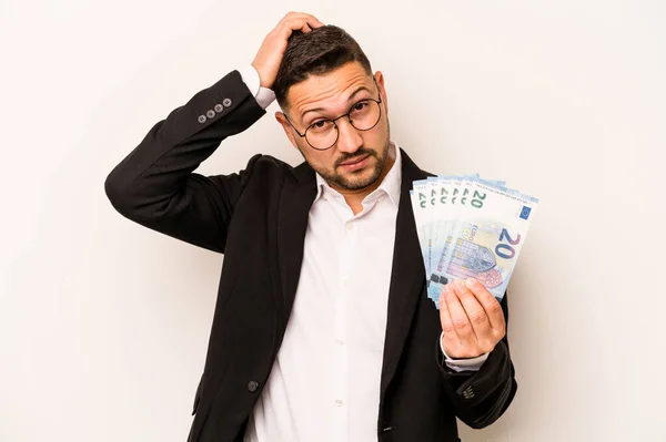 Business Hispanic Man Holding Banknotes Isolated White Background Being Shocked — Stock Photo, Image