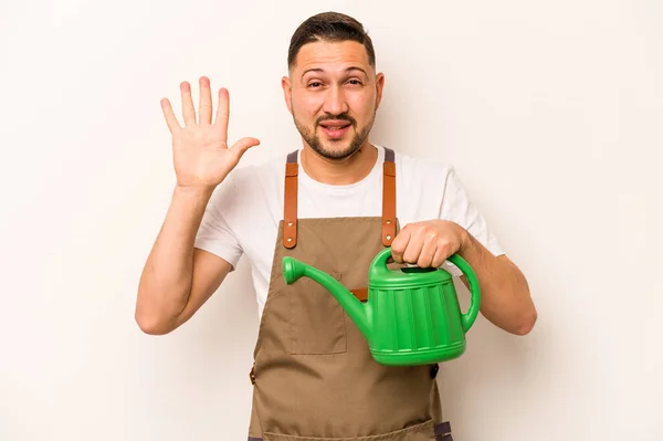 Gardener Hispanic Man Holding Watering Can Isolated White Background Smiling — Foto Stock
