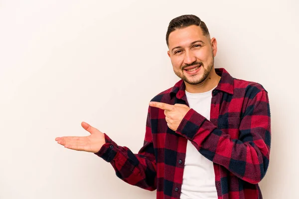 Young Hispanic Man Isolated White Background Excited Holding Copy Space — Stock Photo, Image