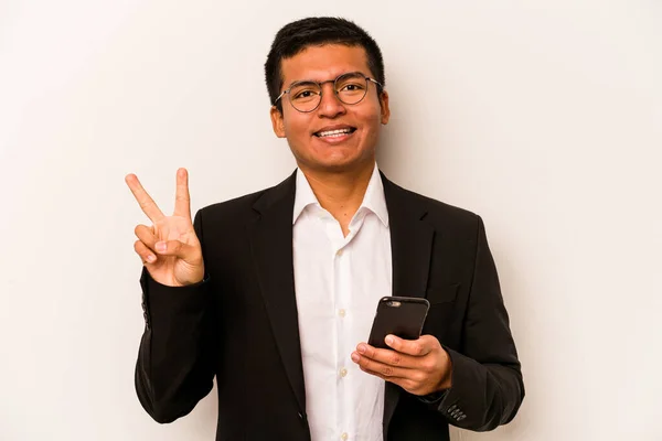 年轻的商界人士手握白色背景的手机 兴高采烈 无忧无虑 手握和平的象征 — 图库照片