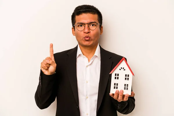 Young Business Hispanic Man Holding Little House Isolated White Background — Stock Photo, Image