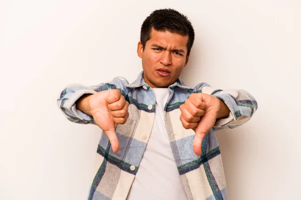 Young Hispanic Man Isolated White Background Showing Thumb Expressing Dislike — стоковое фото