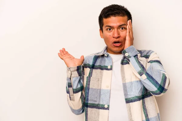 Young Hispanic Man Isolated White Background Impressed Holding Copy Space — Stock Photo, Image