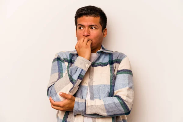 Young Hispanic Man Isolated White Background Biting Fingernails Nervous Very — стоковое фото