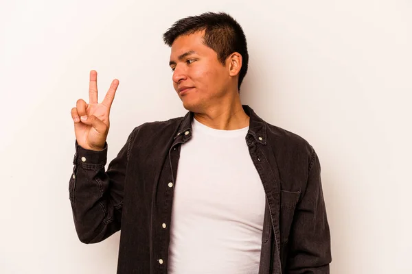 Young Hispanic Man Isolated White Background Joyful Carefree Showing Peace — стоковое фото