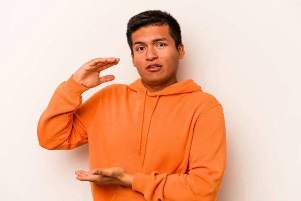 Young Hispanic Man Isolated White Background Holding Something Both Hands — Stock Photo, Image