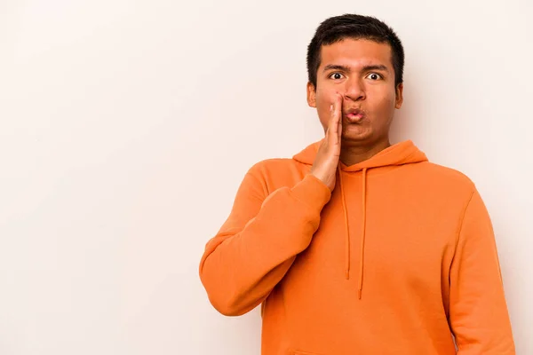 Young Hispanic Man Isolated White Background Saying Secret Hot Braking — стоковое фото