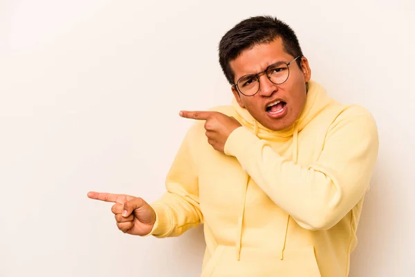 Young Hispanic Man Isolated White Background Pointing Forefingers Copy Space — 스톡 사진