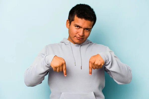 Young Hispanic Man Isolated Blue Background Points Fingers Positive Feeling — 스톡 사진