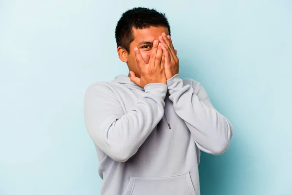 Young Hispanic Man Isolated Blue Background Blink Fingers Frightened Nervous — стоковое фото