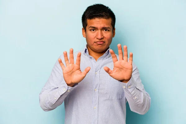 Young Hispanic Man Isolated Blue Background Rejecting Someone Showing Gesture — Stock Photo, Image