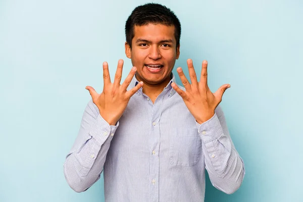 Young Hispanic Man Isolated Blue Background Showing Number Ten Hands — стоковое фото
