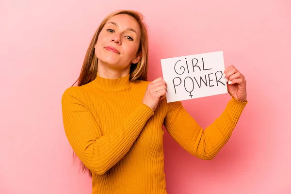 Jovem Caucasiano Segurando Menina Poder Cartaz Isolado Fundo Rosa — Fotografia de Stock