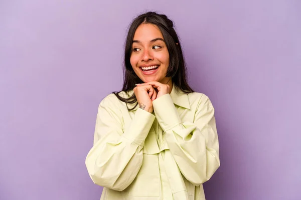 Young Hispanic Woman Isolated Purple Background Keeps Hands Chin Looking — 스톡 사진