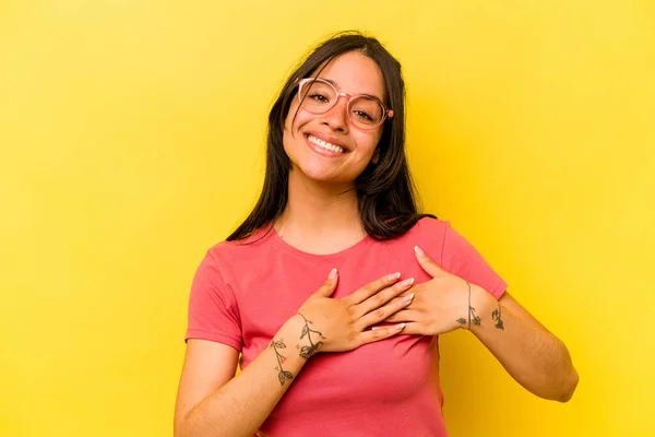 Young Hispanic Woman Isolated Yellow Background Has Friendly Expression Pressing — Fotografia de Stock
