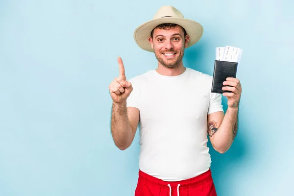 Young Caucasian Traveler Man Holding Passport Isolated Blue Background Showing — 스톡 사진