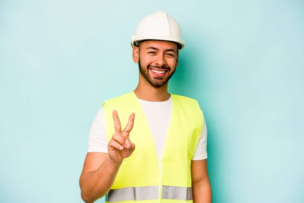Young Laborer Hispanic Man Isolated Blue Background Showing Number Two — 스톡 사진