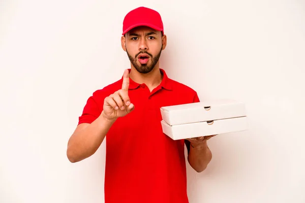 Young Hispanic Delivery Man Holding Pizzas Isolated White Background Having — Stockfoto