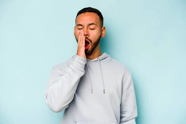 Young Hispanic Man Isolated Blue Background Yawning Showing Tired Gesture — ストック写真