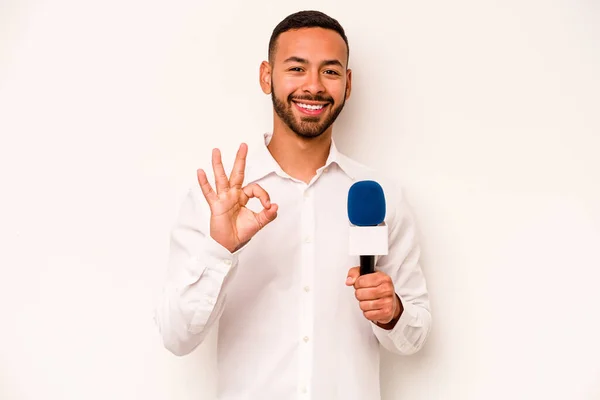Young Hispanic Presenter Isolated Blue Background Cheerful Confident Showing Gesture —  Fotos de Stock