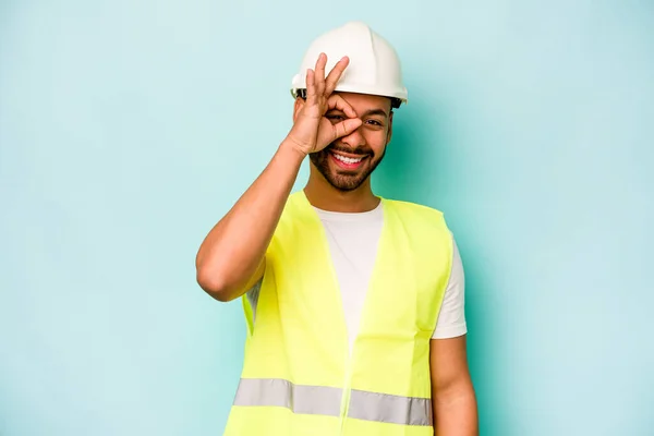 Young Laborer Hispanic Man Isolated Blue Background Excited Keeping Gesture — 스톡 사진