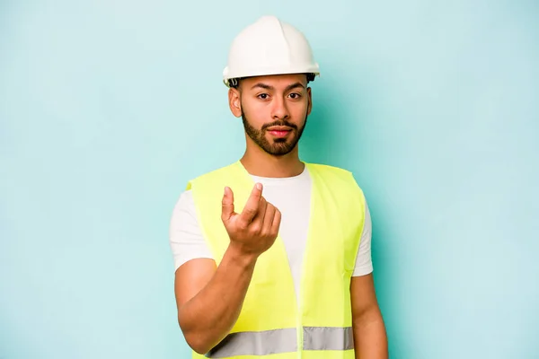 Young Laborer Hispanic Man Isolated Blue Background Pointing Finger You — 스톡 사진
