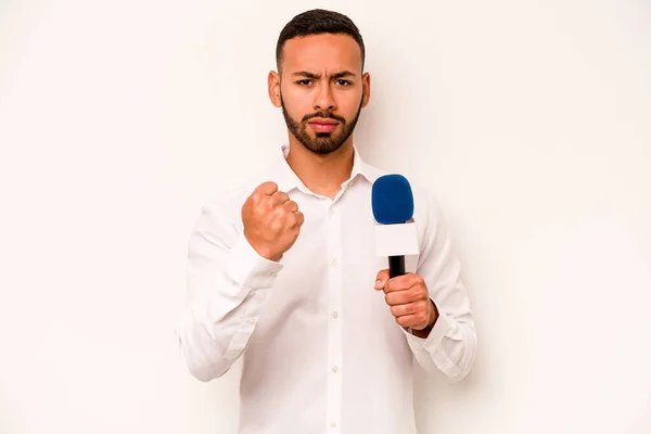 Young Hispanic Presenter Isolated Blue Background Showing Fist Camera Aggressive — Stockfoto