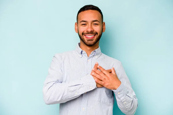 Young Hispanic Man Isolated Blue Background Has Friendly Expression Pressing — ストック写真