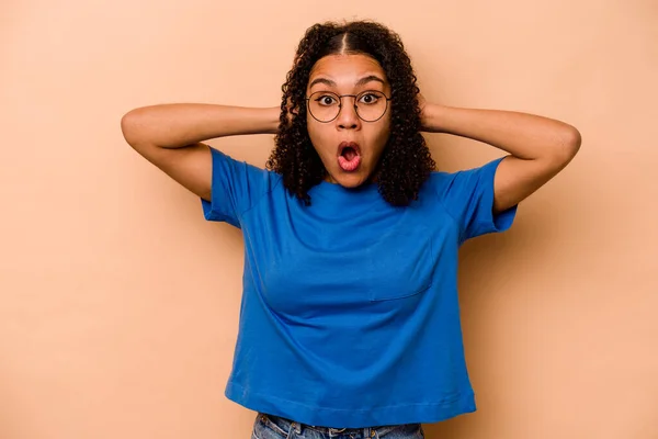 Young African American Woman Isolated Beige Background Being Shocked She — Stock Photo, Image