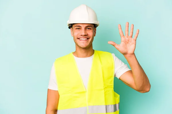Young Laborer Caucasian Man Isolated Blue Background Smiling Cheerful Showing — 스톡 사진