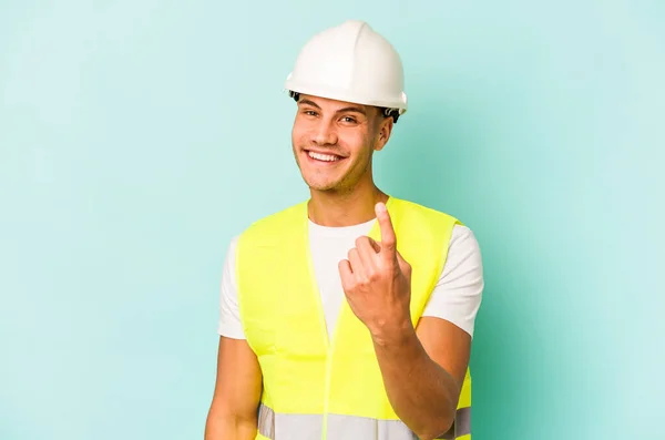 Young Laborer Caucasian Man Isolated Blue Background Pointing Finger You — 스톡 사진