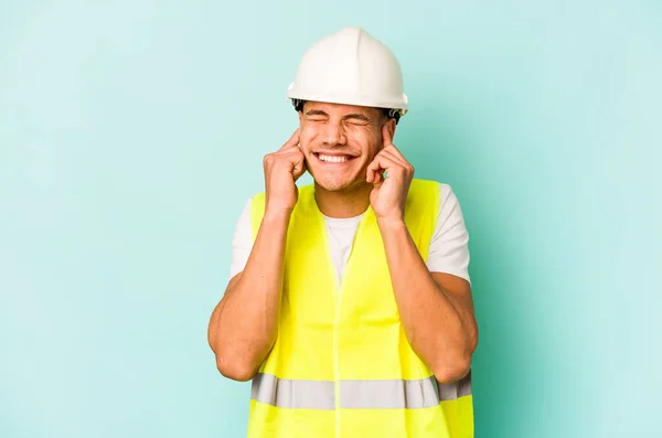 Young Laborer Caucasian Man Isolated Blue Background Covering Ears Hands — 스톡 사진