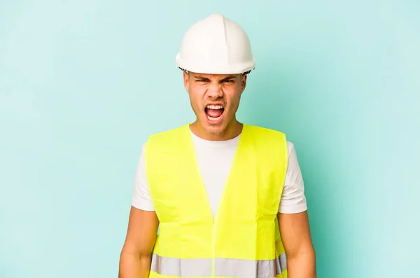 Young Laborer Caucasian Man Isolated Blue Background Screaming Very Angry — Stock Photo, Image