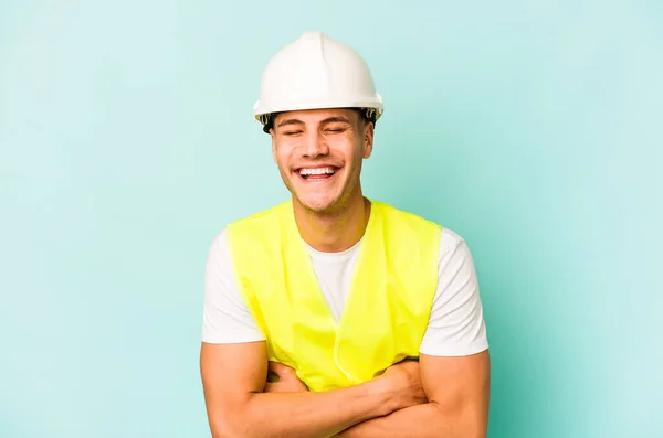 Young Laborer Caucasian Man Isolated Blue Background Laughing Having Fun — Stock Photo, Image