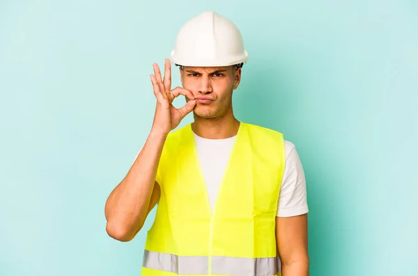 Young Laborer Caucasian Man Isolated Blue Background Fingers Lips Keeping — Stock Photo, Image