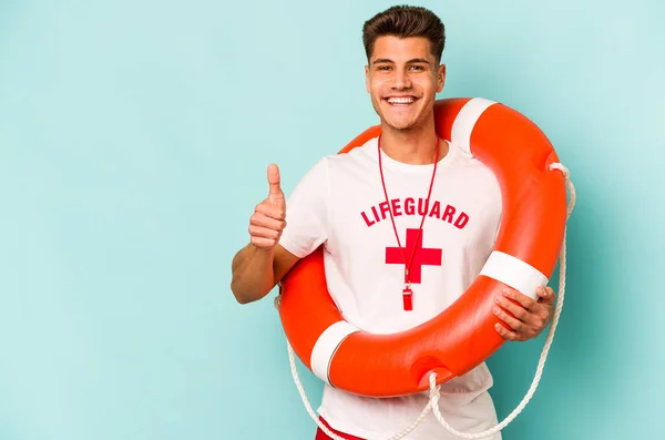 Young Caucasian Lifeguard Isolated Blue Background Smiling Raising Thumb — 图库照片