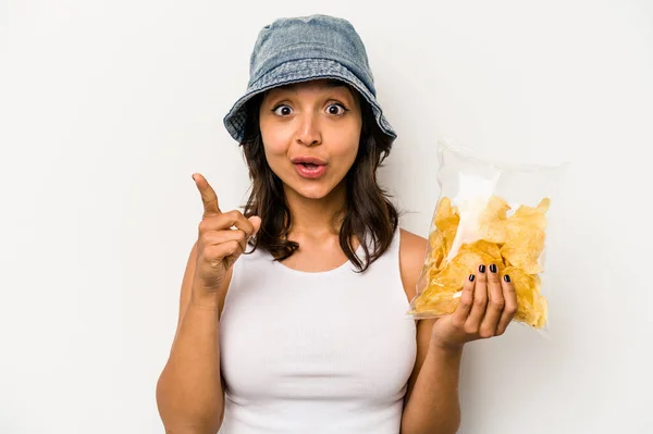 Young Hispanic Woman Holding Bag Chips Isolated White Background Having — Stock Photo, Image