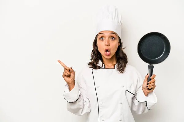 Young Hispanic Chef Woman Isolated White Background Pointing Side — Stock fotografie