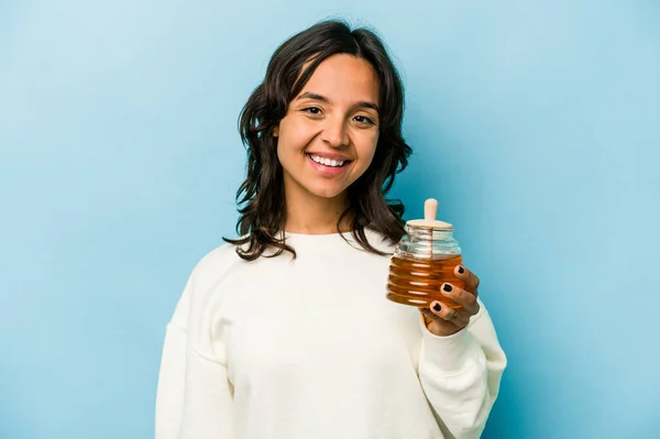Young Hispanic Woman Holding Honey Isolated Blue Background Happy Smiling — Zdjęcie stockowe