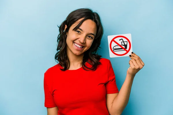 Young Hispanic Woman Holding Eating Sign Isolated Blue Background Laughing — Φωτογραφία Αρχείου