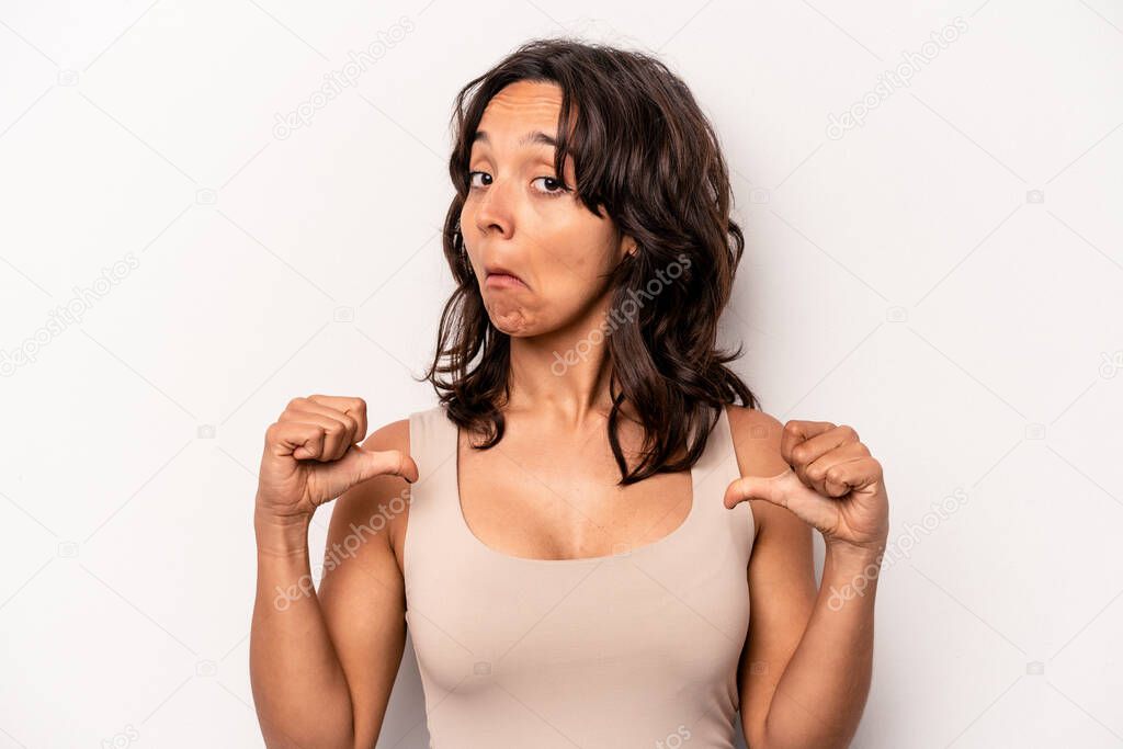 Young hispanic woman isolated on white background feels proud and self confident, example to follow.