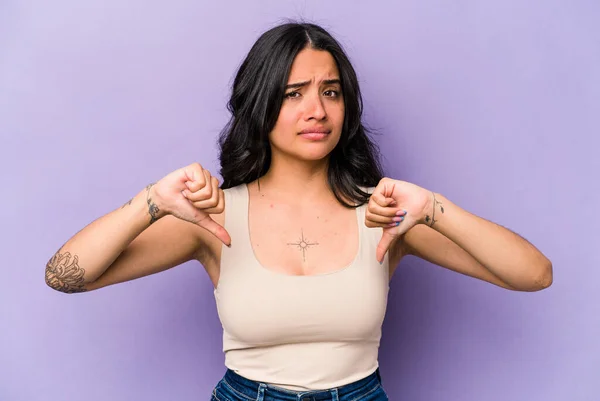 Young Hispanic Woman Isolated Purple Background Showing Thumb Disappointment Concept — 스톡 사진