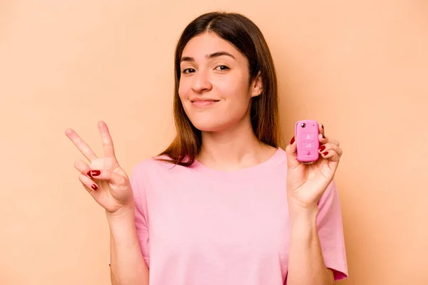 Young Hispanic Woman Holding Keys Car Isolated Beige Background Showing — Stock Photo, Image