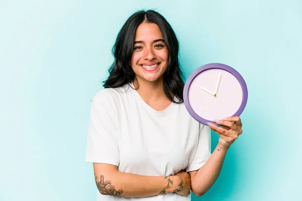Young Hispanic Woman Holding Clock Isolated Blue Background Laughing Having — Fotografia de Stock