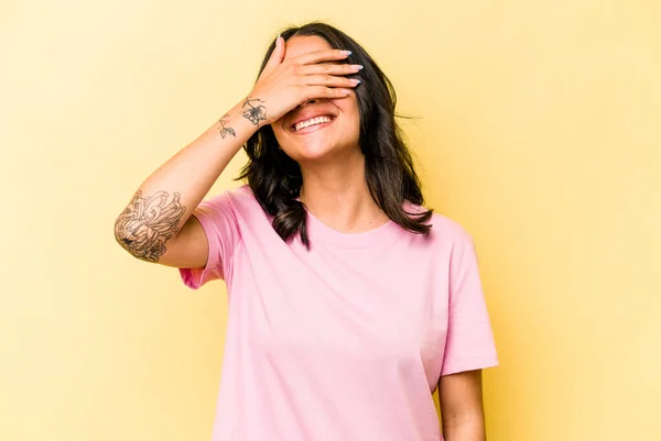 Young Hispanic Woman Isolated Yellow Background Covers Eyes Hands Smiles — Foto Stock
