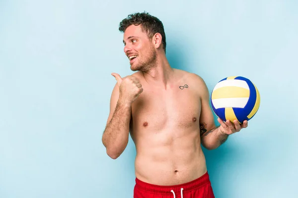 Young Caucasian Man Playing Volley Isolated Blue Background Points Thumb — Stok fotoğraf