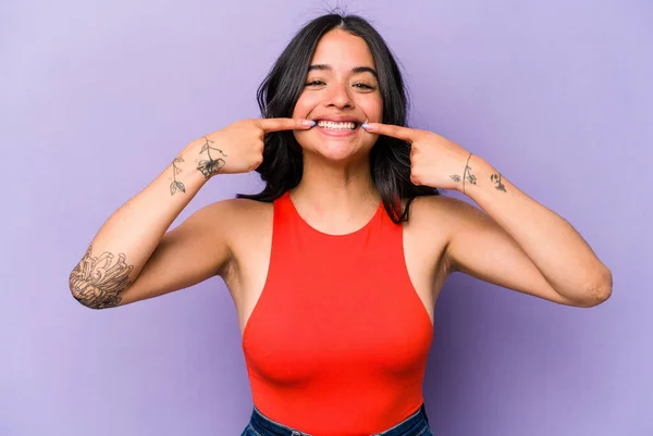 Young Hispanic Woman Isolated Purple Background Smiles Pointing Fingers Mouth — Stock Photo, Image
