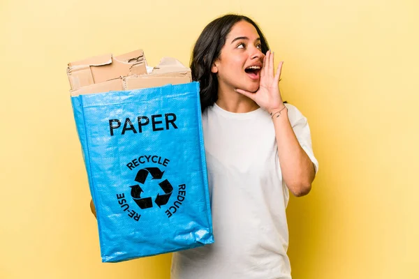 Young Hispanic Woman Recycling Paper Isolated Yellow Background Shouting Holding — Stock fotografie
