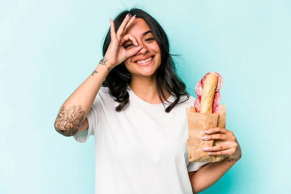 Young Hispanic Woman Eating Sandwich Isolated Blue Background Excited Keeping — Stockfoto
