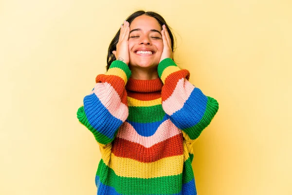 Young Hispanic Woman Isolated Yellow Background Laughs Joyfully Keeping Hands — Foto de Stock